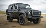 Land Rover Defender Rocksliders Stainless Steel on Beach